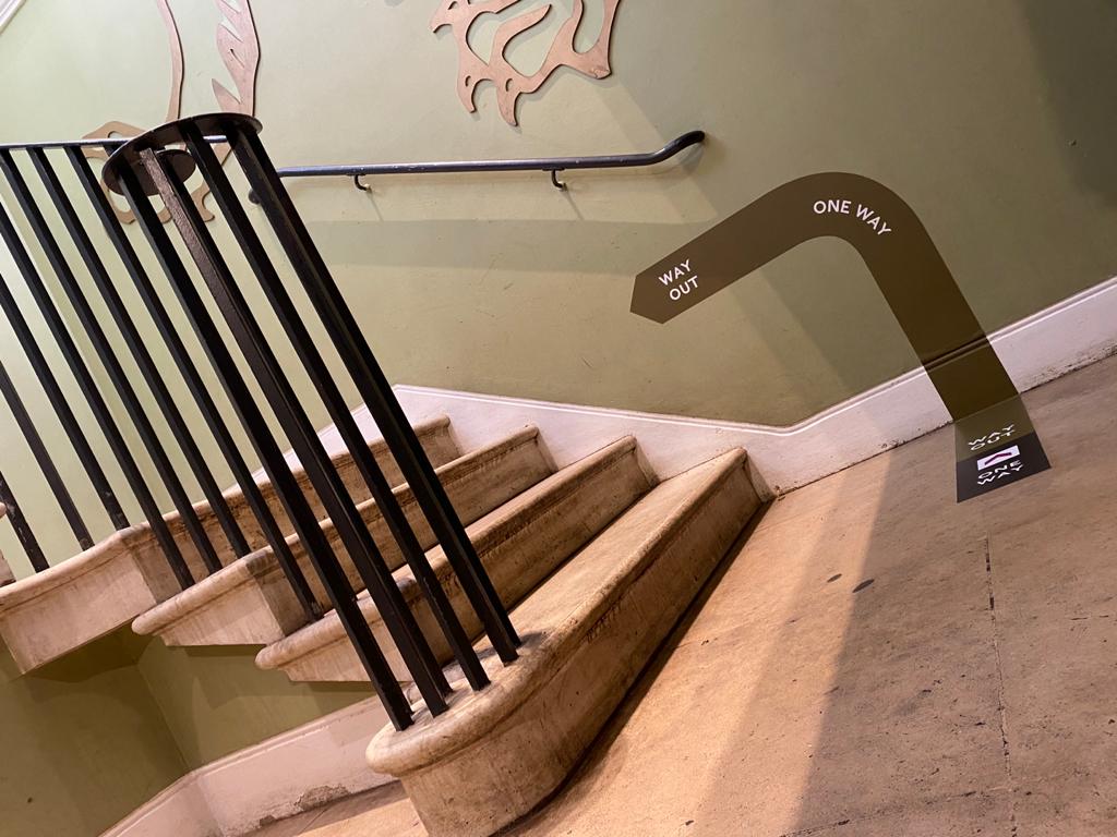 floor wall directional way out sign