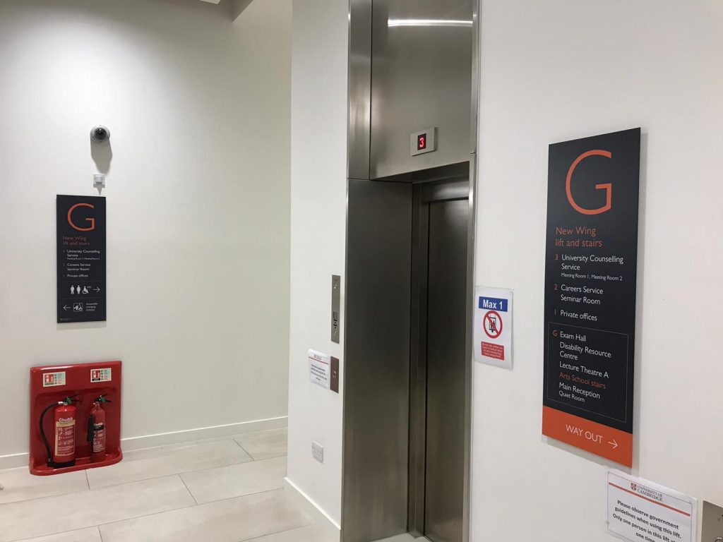 elevator directional sign